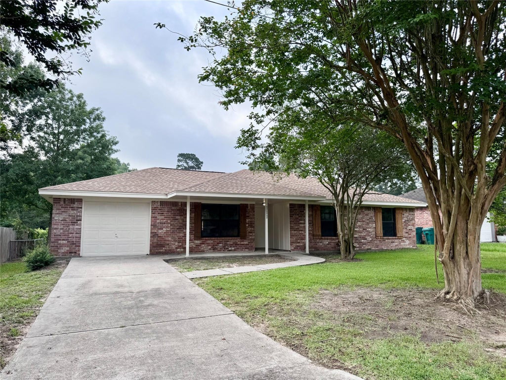 Photo of 111 Little Bill Lane, Willis, TX 77378 (MLS # 42691893)