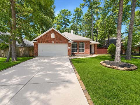 Photo of 22 Cypress Bayou Court, The Woodlands, TX 77382 (MLS # 51969941)