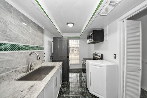 Photo of 7954 Grove Ridge Drive, Houston, TX 77061 (MLS # 10243880)