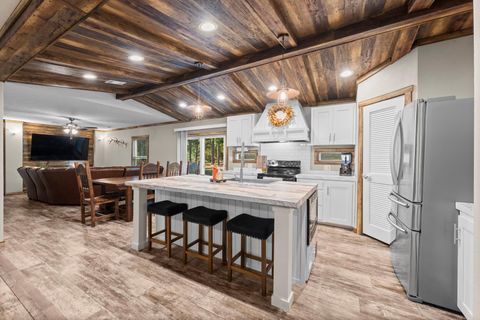 Photo of 577 S Winding River Road, Oakhurst, TX 77364 (MLS # 26282002)