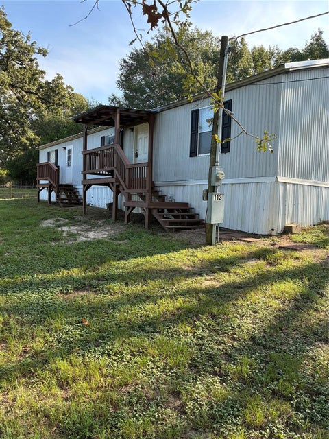 Photo of 112 Strawberry Road, Huntsville, TX 77320 (MLS # 4948198)