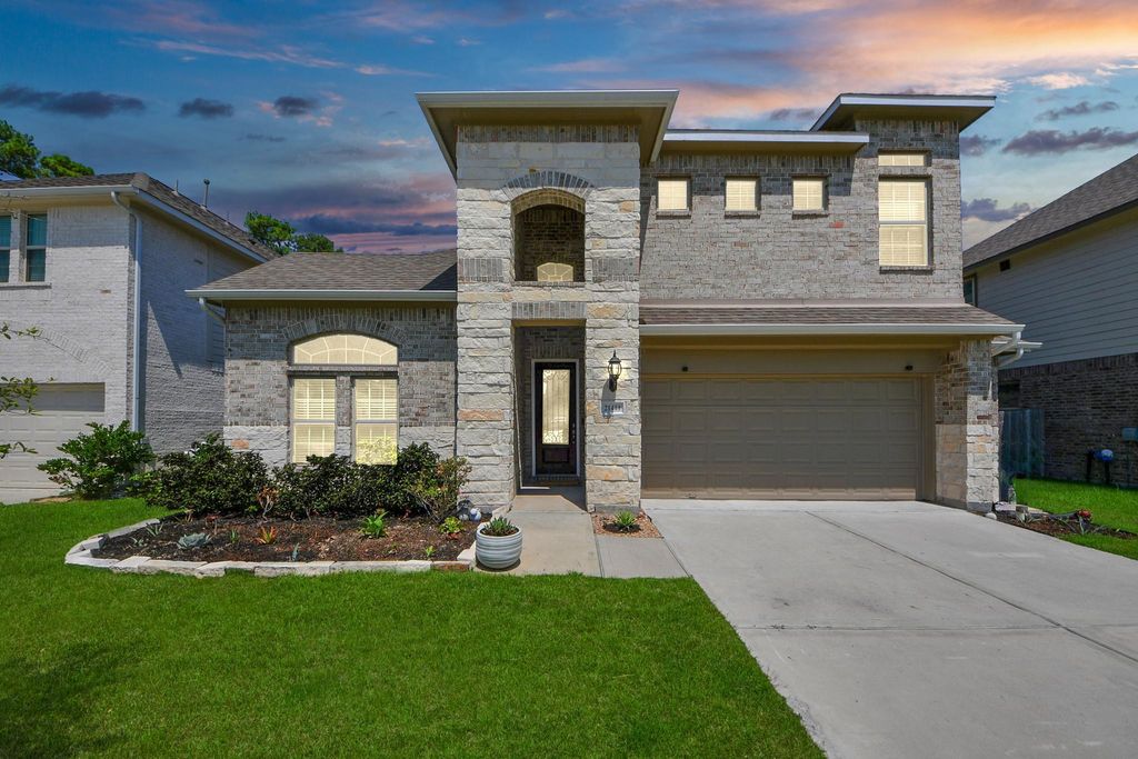 Photo of 21444 Kings Guild Lane, Kingwood, TX 77339 (MLS # 83688800)