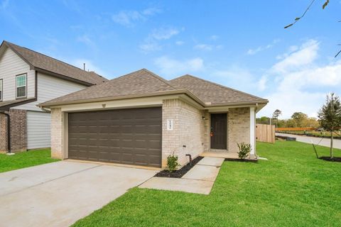 Photo of 1241 Narrow Heights Dr, Conroe, TX 77301 (MLS # 28849908)
