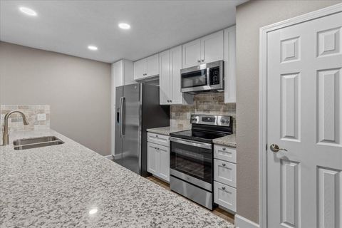 Photo of 9426 Willow Wood Lane, Houston, TX 77086 (MLS # 16817800)