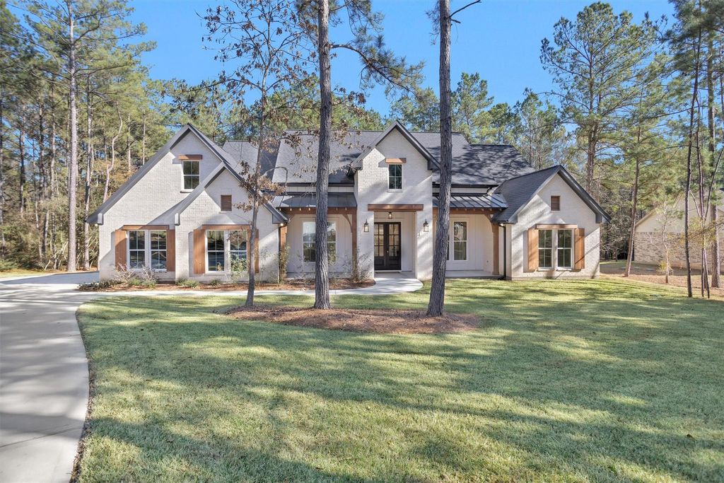Photo of 900 Lonestar Road, Huntsville, TX 77340 (MLS # 83892971)