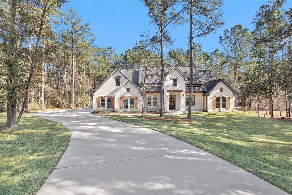 Photo of 900 Lonestar Road, Huntsville, TX 77340 (MLS # 83892971)