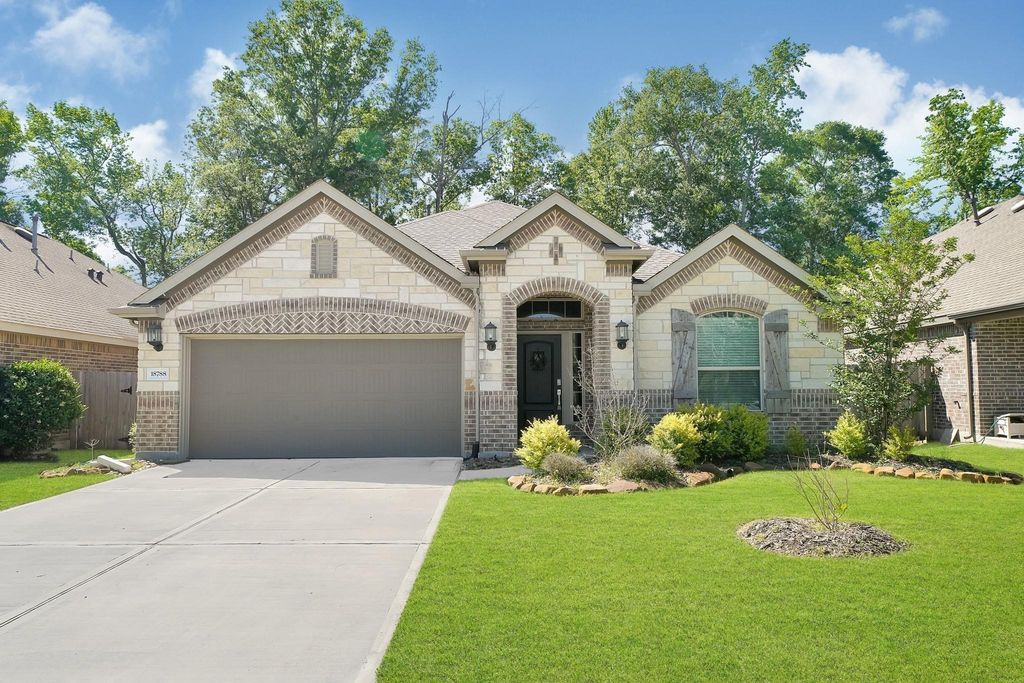 Photo of 18788 Laurel Hills Drive, New Caney, TX 77357 (MLS # 24460733)