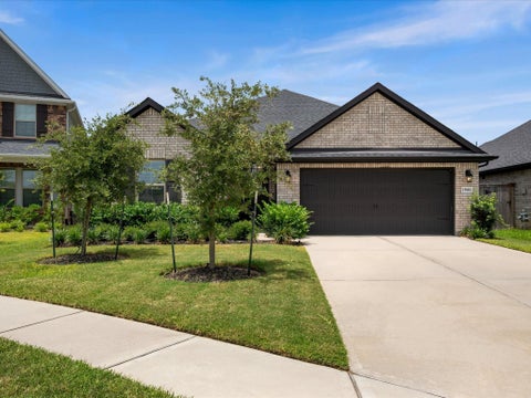 Photo of 15881 Hayes Market Loop, Conroe, TX 77302 (MLS # 65076144)