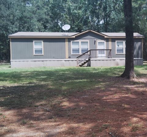 Photo of 1045 County Rd 6474, Dayton, TX 77535 (MLS # 36182765)