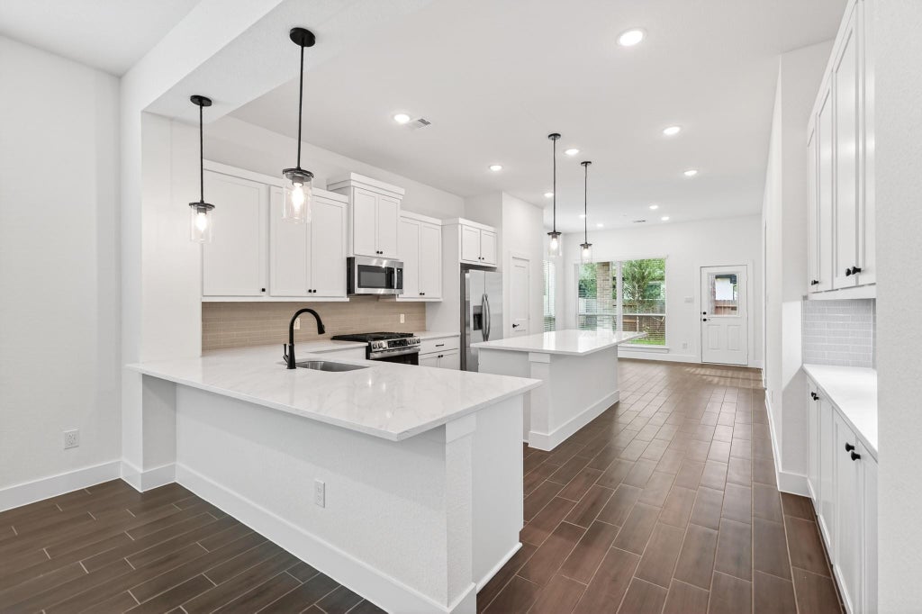 Photo of 295 Mallards Rim Drive, Willis, TX 77318 (MLS # 70581340)