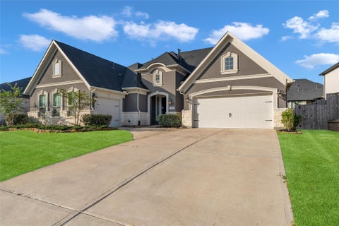 Photo of 1014 Lakemont Bend Lane, Pinehurst, TX 77362 (MLS # 65834068)