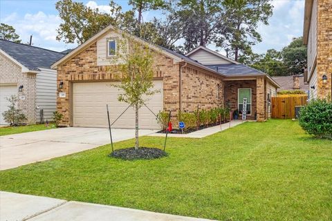 Photo of 418 Emerald Thicket Lane, Houston, TX 77336 (MLS # 70716037)