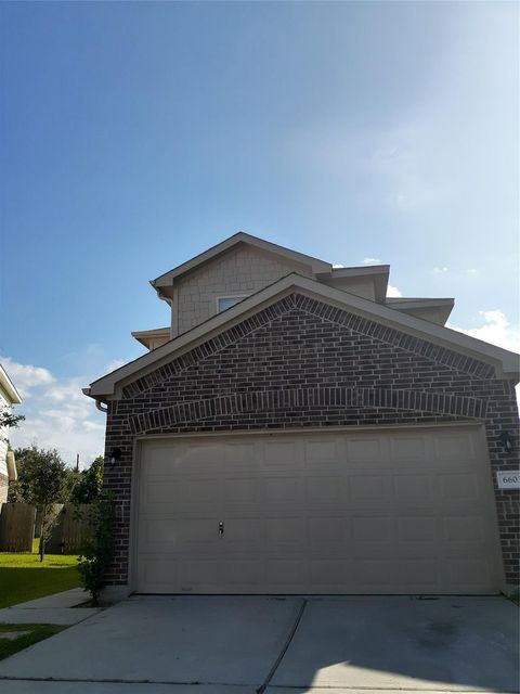 Photo of 6603 Sharpstone Creek Lane, Houston, TX 77084 (MLS # 93889402)