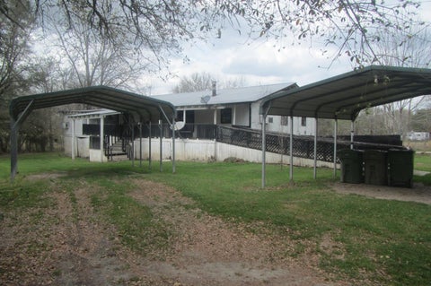 Photo of 11 Harmon Creek Drive, Huntsville, TX 77320 (MLS # 13575330)