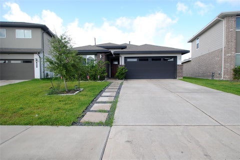 Photo of 7634 Ramsgate Cliff Lane, Richmond, TX 77407 (MLS # 26299052)