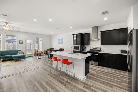 Photo of 12313 Churchill Downs Drive, Houston, TX 77047 (MLS # 98936913)