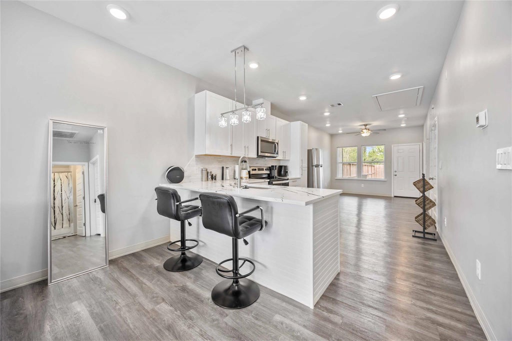 Photo of 8009 Sterlingshire Street #B, Houston, TX 77078 (MLS # 45544880)