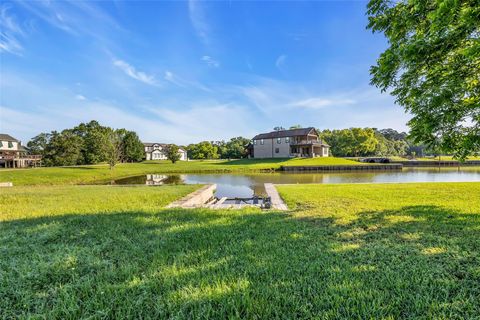 Photo of 1 Island Point, Huntsville, TX 77340 (MLS # 40609950)
