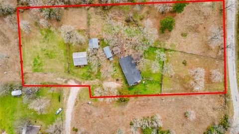 Photo of 6 Jenkins Spur, Huntsville, TX 77320 (MLS # 77696813)