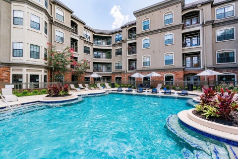 Photo of 4855 Magnolia Cove Drive #163, Houston, TX 77345 (MLS # 44100978)