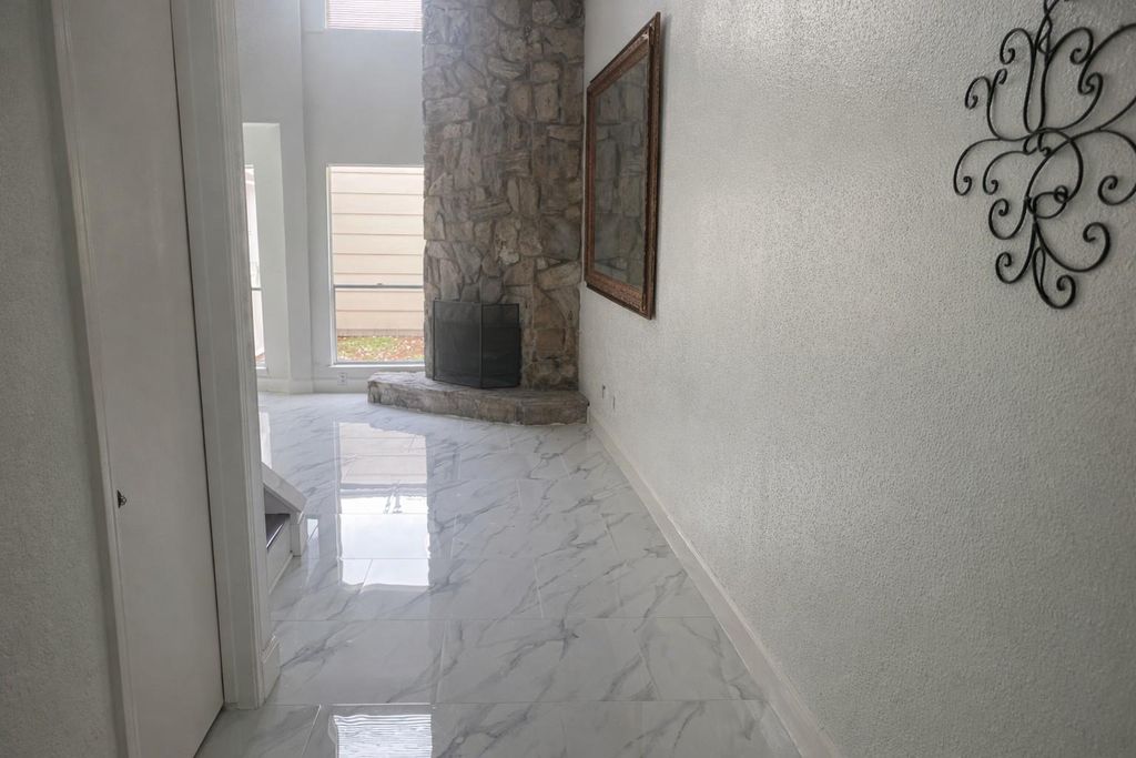 Photo of 12255 W Village Drive #E, Houston, TX 77039 (MLS # 50305170)