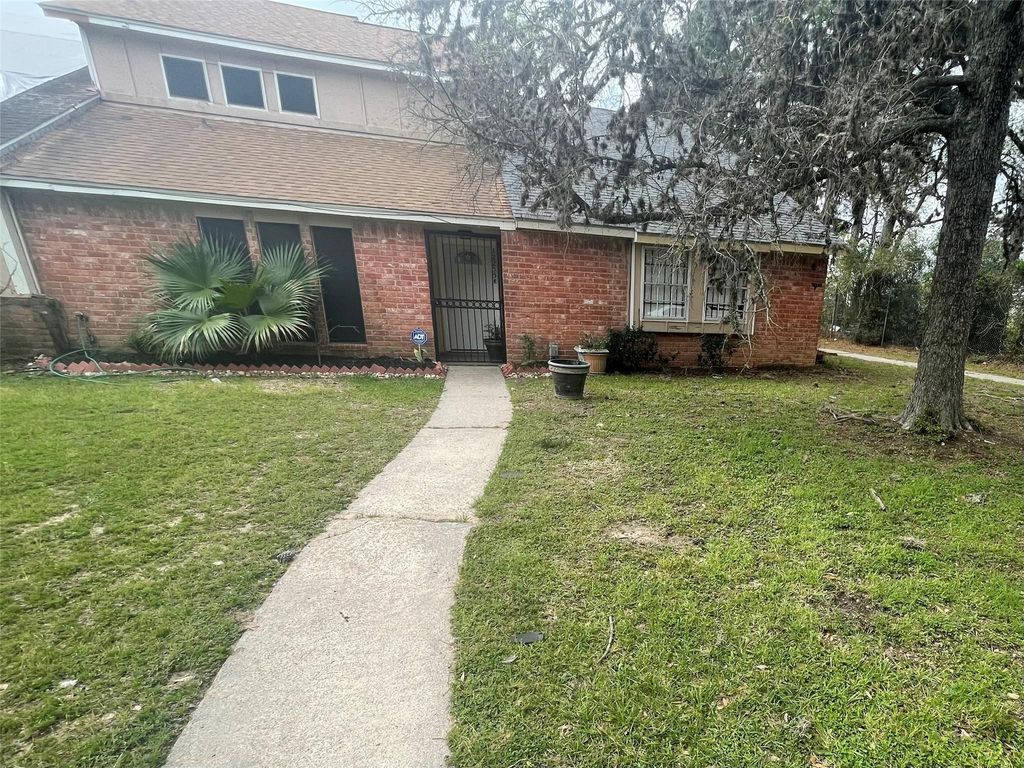 Photo of 12255 W Village Drive #E, Houston, TX 77039 (MLS # 50305170)