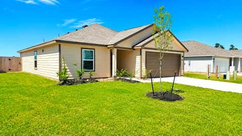 Photo of 10481 Sugar Mill Dr Dr, Conroe, TX 77306 (MLS # 90143839)