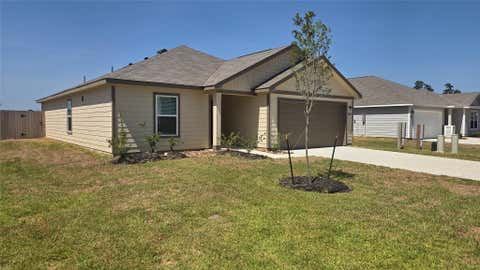 Photo of 10481 Sugar Mill Dr Dr, Conroe, TX 77306 (MLS # 90143839)