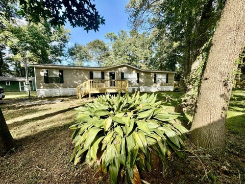 Photo of 1 Dove Street, New Waverly, TX 77358 (MLS # 55940531)