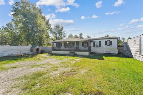 Photo of 924 County Road 5021, Cleveland, TX 77327 (MLS # 82927653)