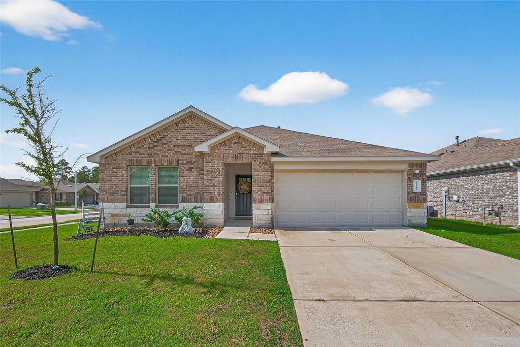 Photo of 18288 Woodpecker Trail, New Caney, TX 77357 (MLS # 46209130)