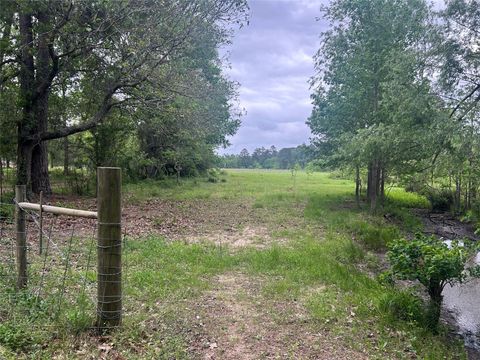 Photo of 2 Minnie West Rd, Hull, TX 77564 (MLS # 87105464)