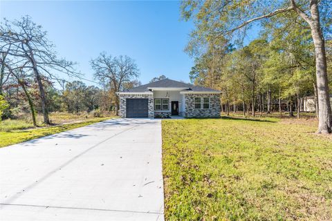Photo of 164 County Road 3370, Cleveland, TX 77327 (MLS # 11245571)