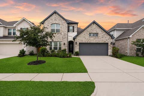 Photo of 18403 Summerland Lake Way, Cypress, TX 77433 (MLS # 65692872)