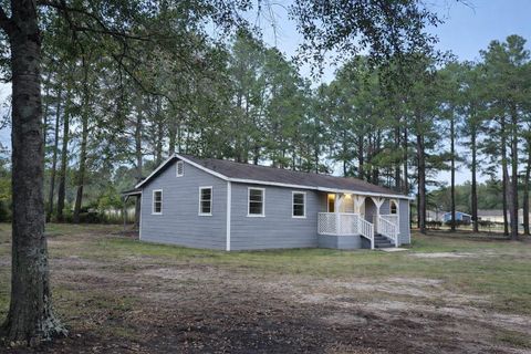 Photo of 221 Macie Lane, Cleveland, TX 77328 (MLS # 49464406)