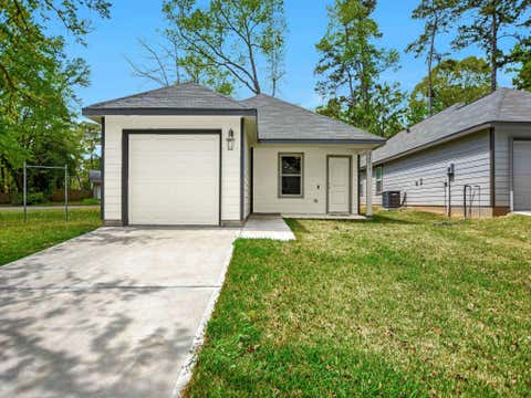 Photo of 24617 Pools Creek Way Way, Huntsville, TX 77320 (MLS # 21568919)