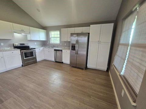 Photo of 998 Cypress Lakes Circle, Cleveland, TX 77327 (MLS # 87963250)