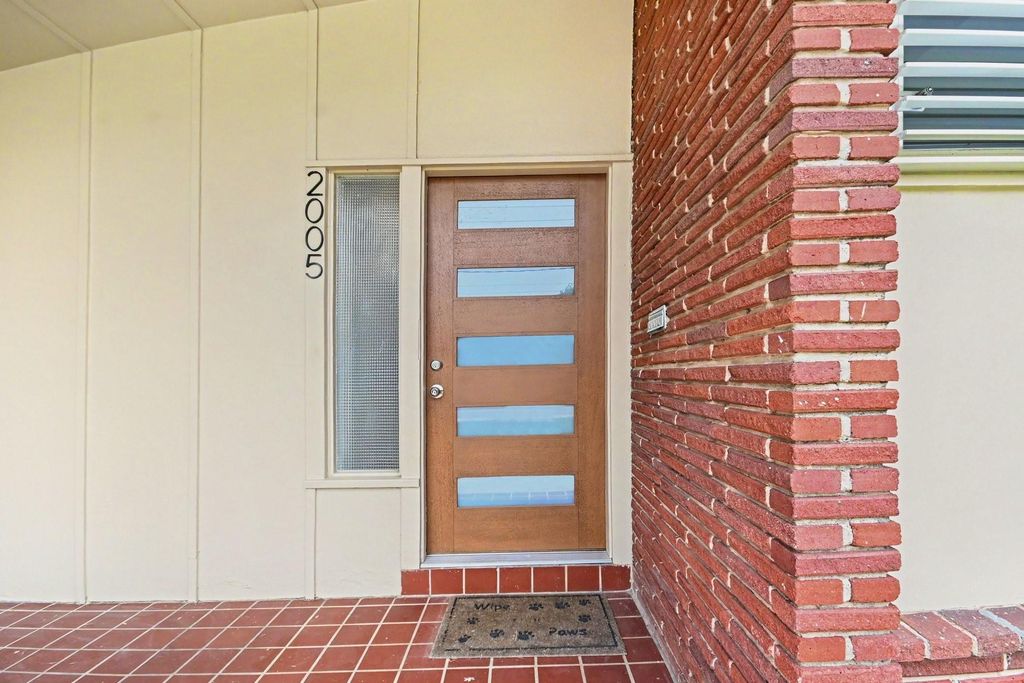 Photo of 2005 Mary Moody Northen Boulevard, Galveston, TX 77551 (MLS # 77343082)