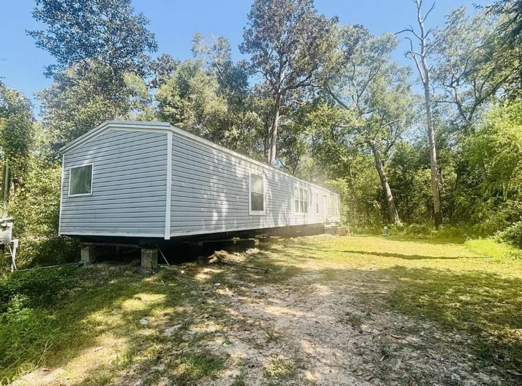 Photo of 91 Little Lane, Shepherd, TX 77371 (MLS # 83969384)