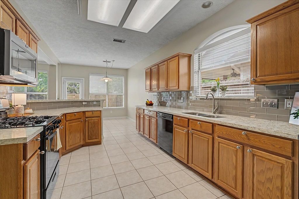 Photo of 20911 Water Point Trail, Humble, TX 77346 (MLS # 68564783)