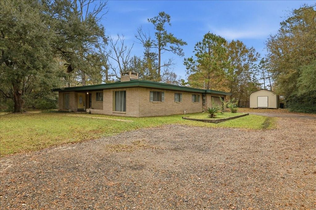 Photo of 3042 Parish Cemetery Road, Orange, TX 77632 (MLS # 43665063)