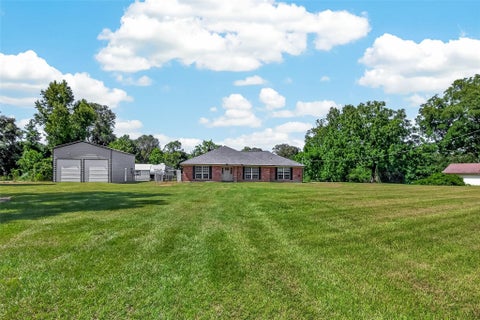 Photo of 158 County Road 2194, Cleveland, TX 77327 (MLS # 59170806)