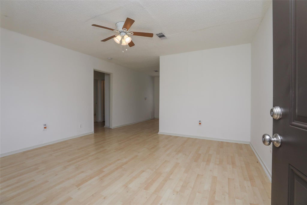 Photo of 5418 Myrtlewood Street, Houston, TX 77033 (MLS # 77448574)