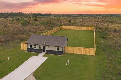 Photo of 2221 Road 591501, Cleveland, TX 77327 (MLS # 66496791)