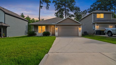 Photo of 709 Little River Drive, Montgomery, TX 77316 (MLS # 15021296)