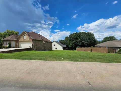 Photo of 2 Harbour Town Drive, Conroe, TX 77356 (MLS # 62830888)