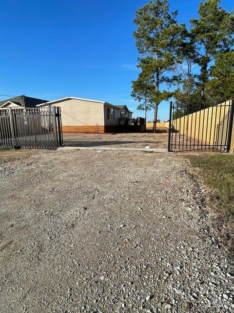 Photo of 132 Road 5132, Cleveland, TX 77327 (MLS # 23186132)