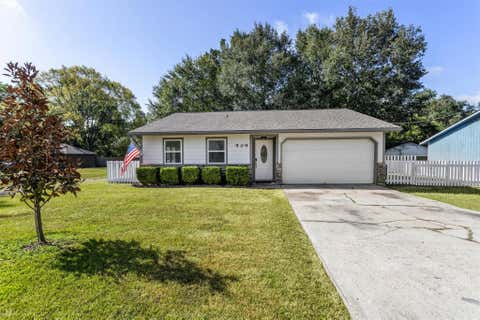 Photo of 909 Stewart Street, Montgomery, TX 77316 (MLS # 97504224)