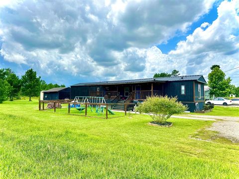 Photo of 377 Road 5120, Cleveland, TX 77327 (MLS # 47765059)