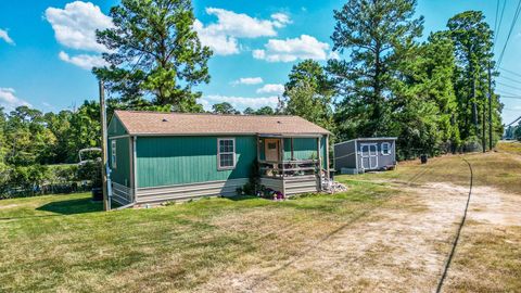 Photo of 1317 Fm 3186, Onalaska, TX 77360 (MLS # 25930527)